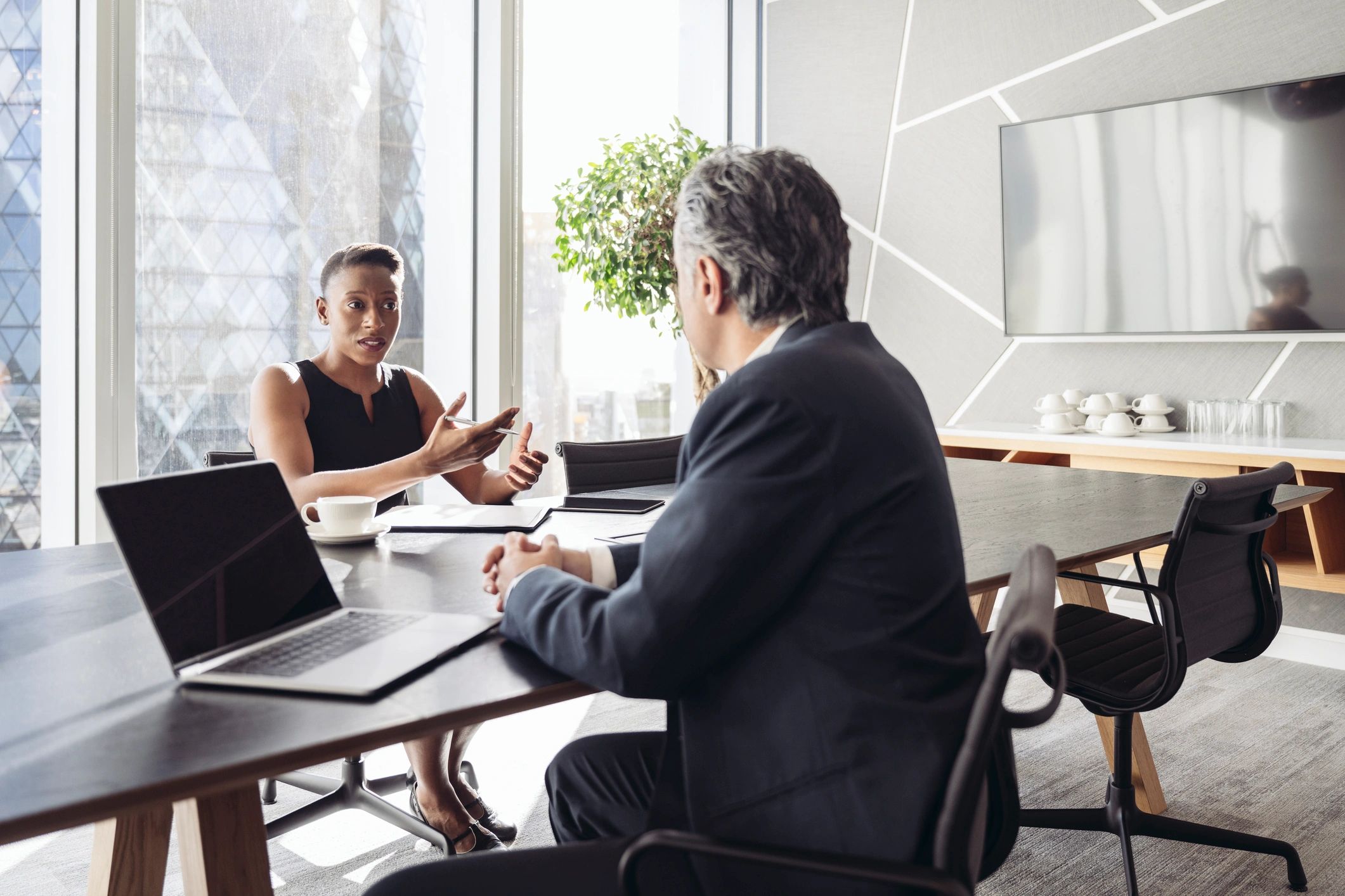 Investment managers discussing financial strategy