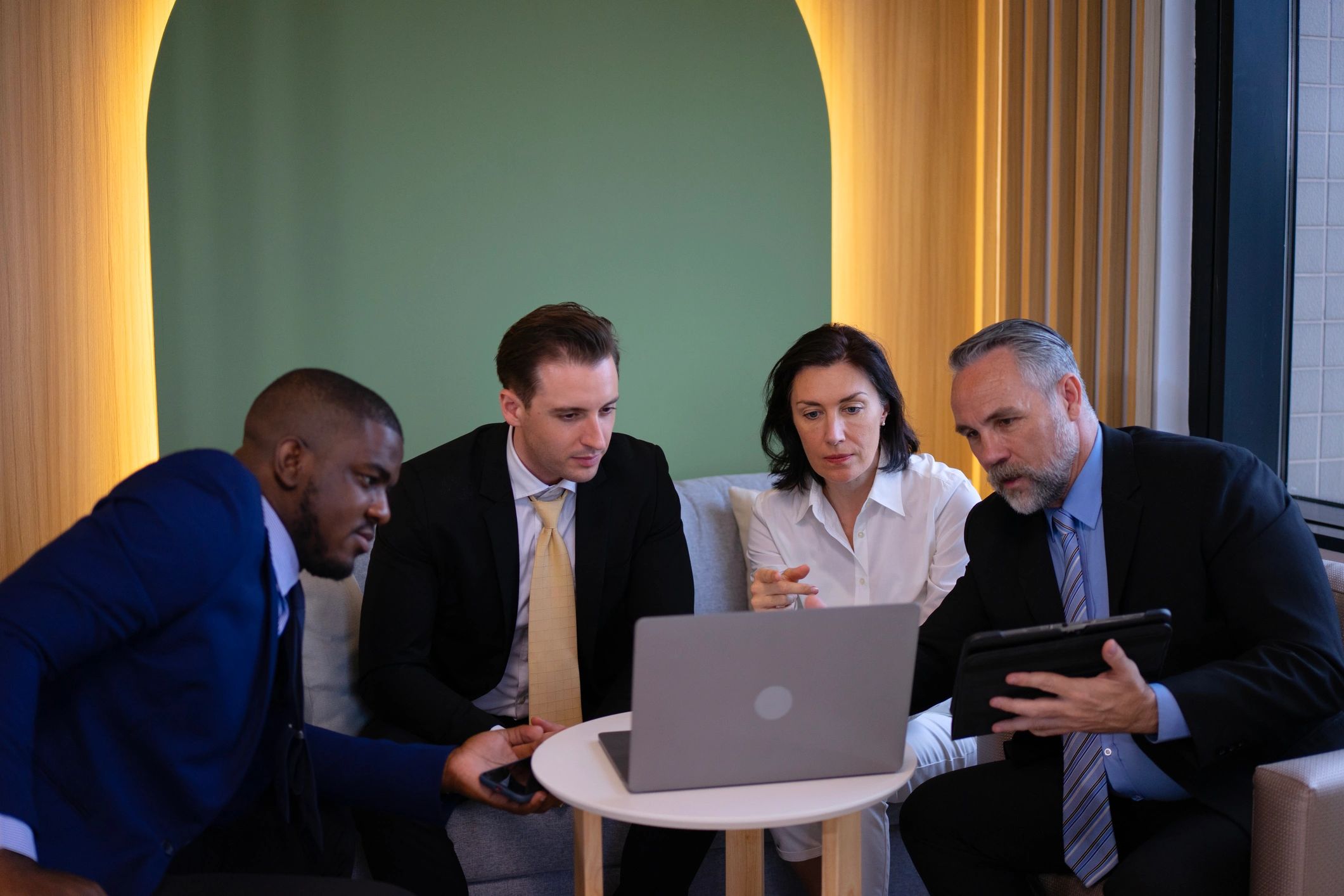 Professional financial team collaborating in a modern office